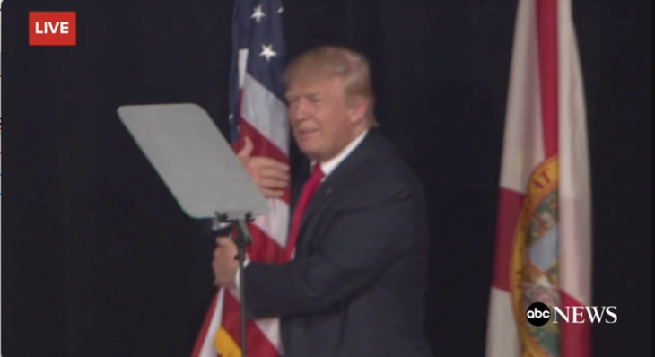 trump-hugging-flag